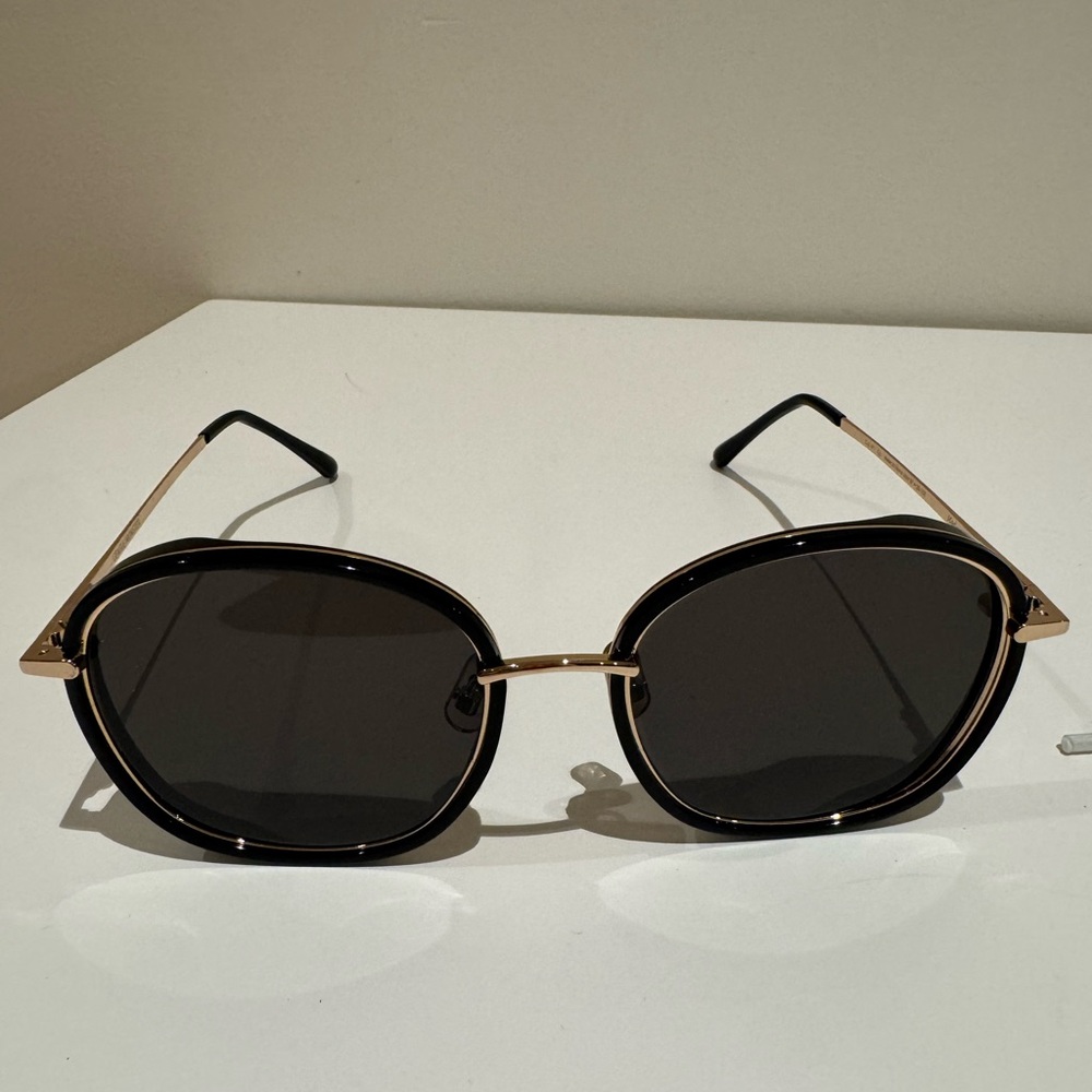Gentle Monster Black and Gold Rimmed Sunglasses